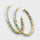 Boucles d'oreilles en or iridescentes